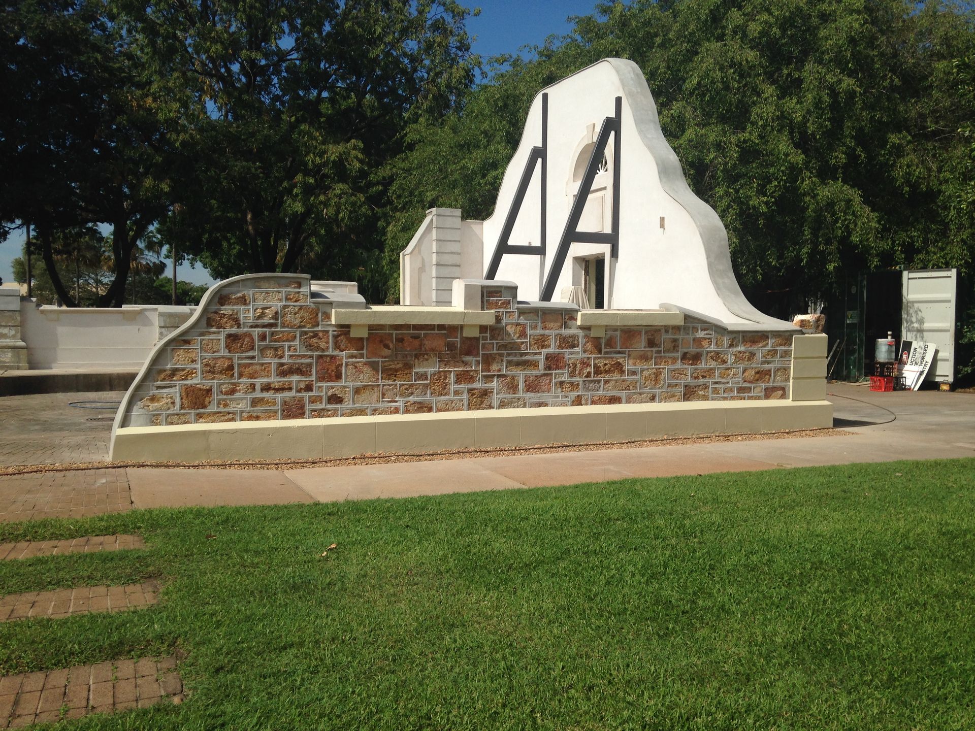 Stone Wall With White Structure, Black Beams, in Park — Neil Griffiths Rendering in Berry Springs, NT