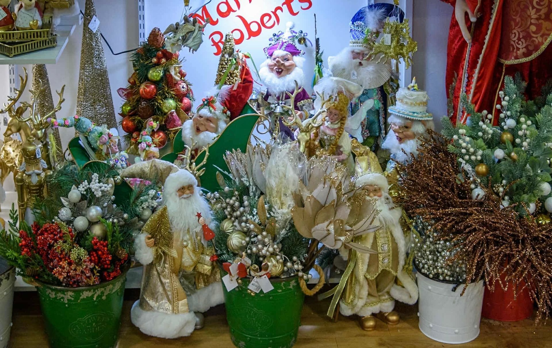 A group of christmas decorations are sitting on a table.