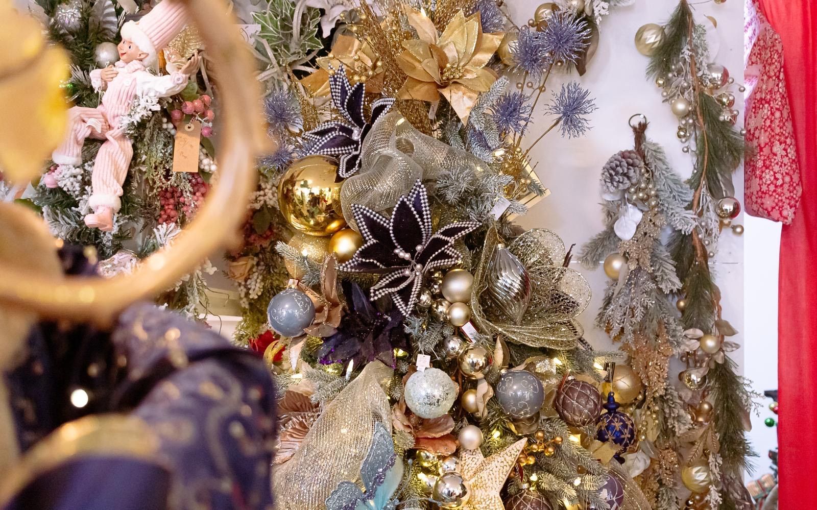 A close up of a christmas tree with decorations on it.