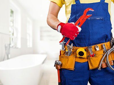 Plumber With Tool Belt Standing — Oak Lawn, IL — Hession Plumbing & Sewer Service