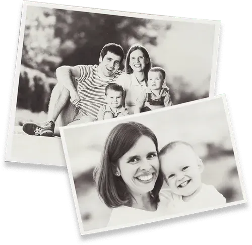 Two black-and-white photos: one showing a family of four outdoors, the other showing an adult smiling with a young child.