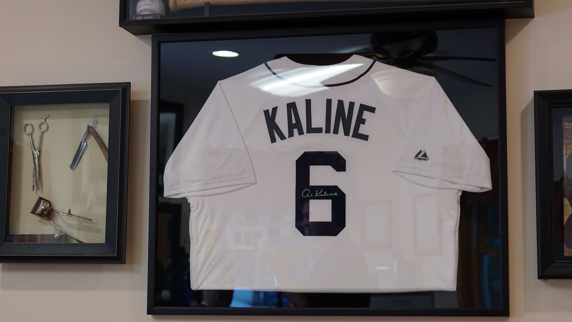 A framed and autographed Al Kaline Detroit Tigers baseball jersey with number 6.