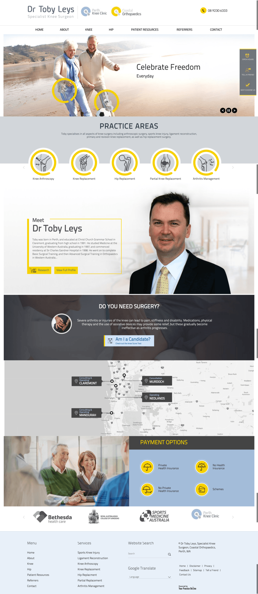 A man in a suit and tie is standing in front of a website.