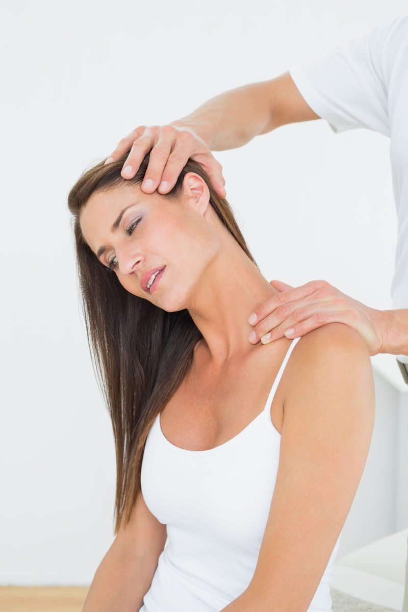 woman having neck stretched