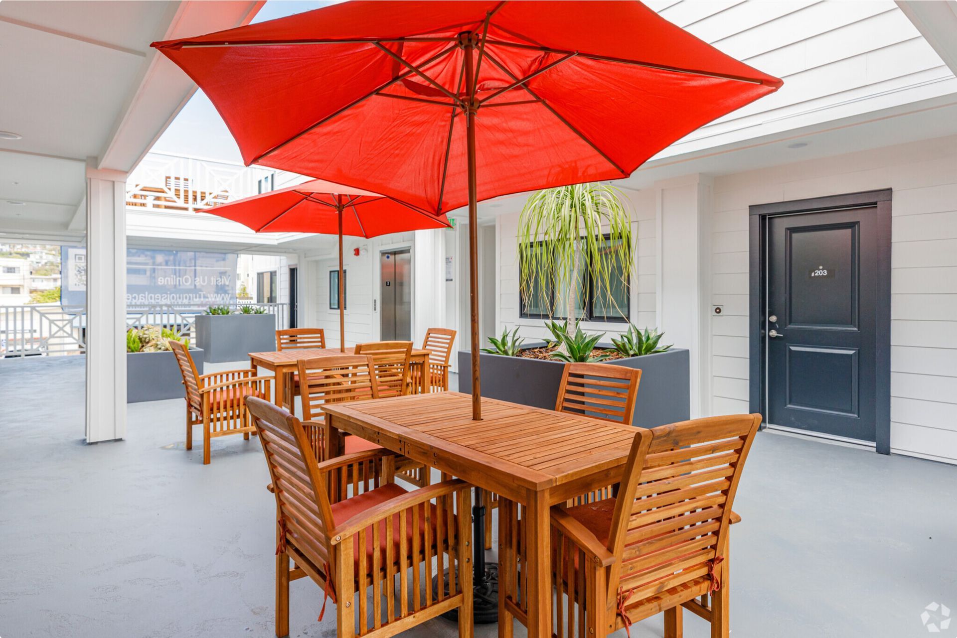 Turquoise Place  table set with umbrella