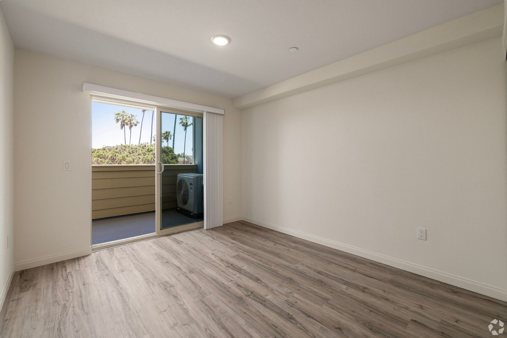 The Lamont -living room with balcony door