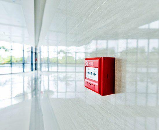 Red Fire Alarm On White Wall — Birmingham, AL — Automatic Fire Systems