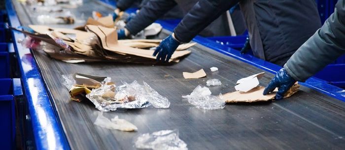 Image of people sorting goods