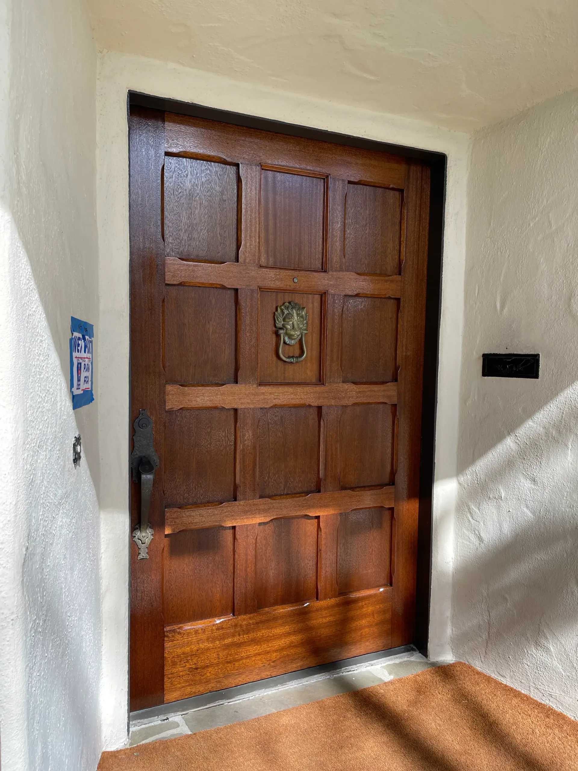 stained front doorin