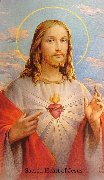 A picture of jesus with the words sacred heart of jesus on the bottom