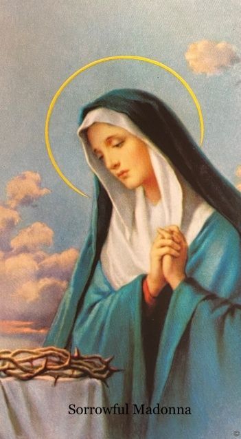 A painting of the virgin mary holding a crown of thorns