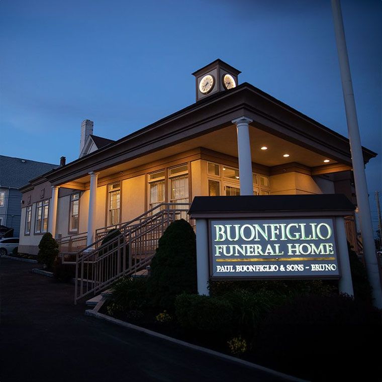 A building with a sign that says buonfiglio funeral home