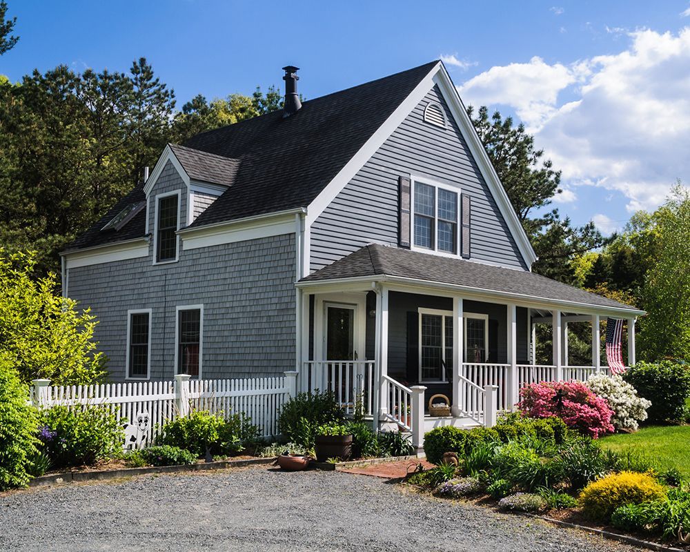 House with a Porch and a White Picket Fence — Kingston, NY — JMD Home Improvements
