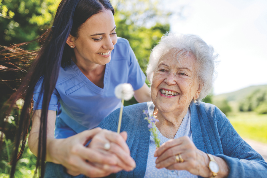 Caregiver and Client Enjoying Outside