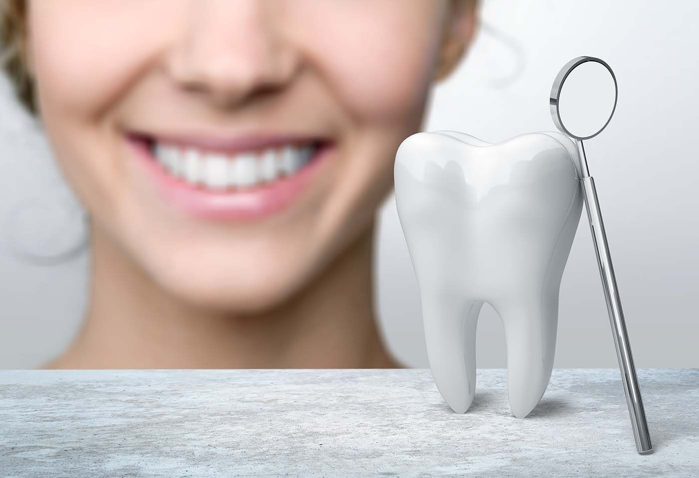 Smiling patient brushing teeth as part of a daily oral hygiene routine