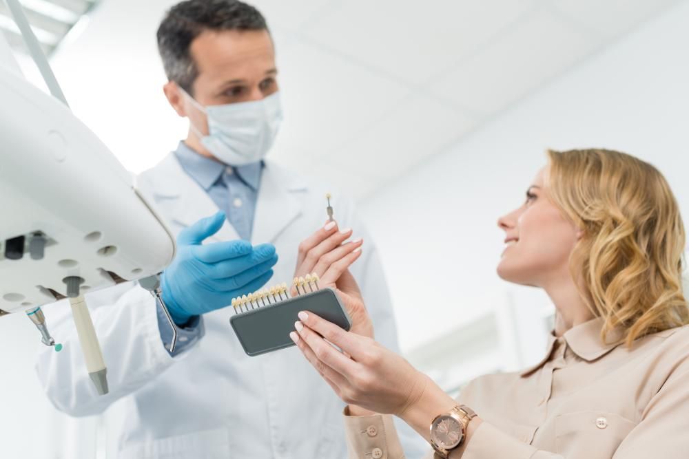 explaining dental implant procedure