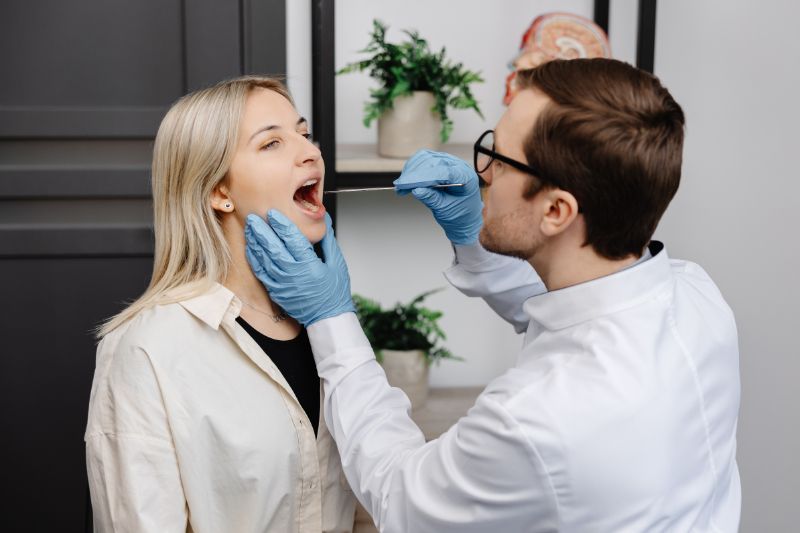 dentist examing mouth