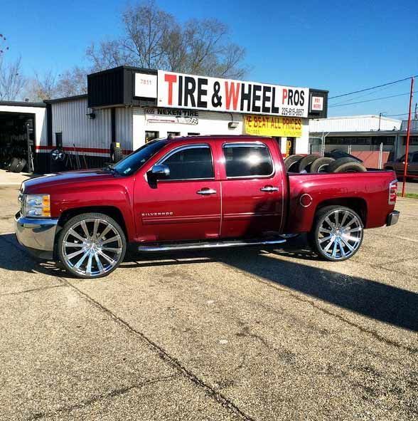 Red Pick-up Car | Baton Rouge, LA | Tire & Wheel Pros