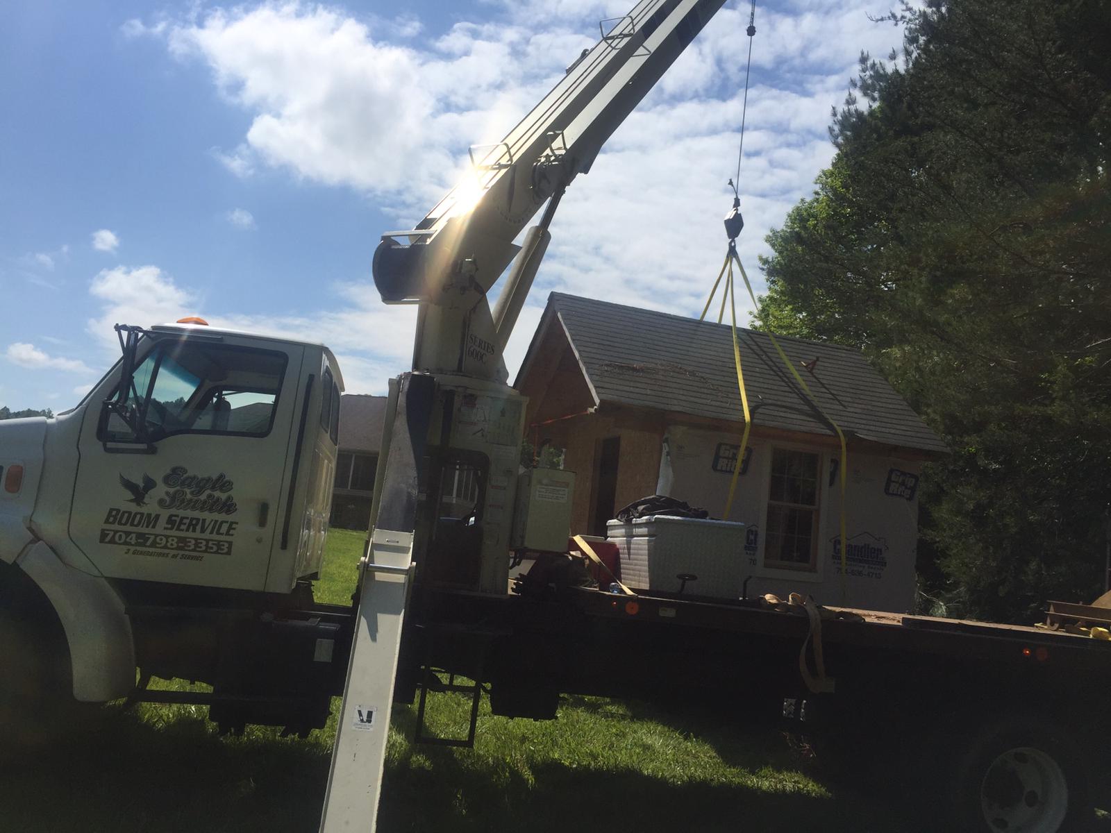 Crane service lifting pre-built treehouse in Statesville, NC