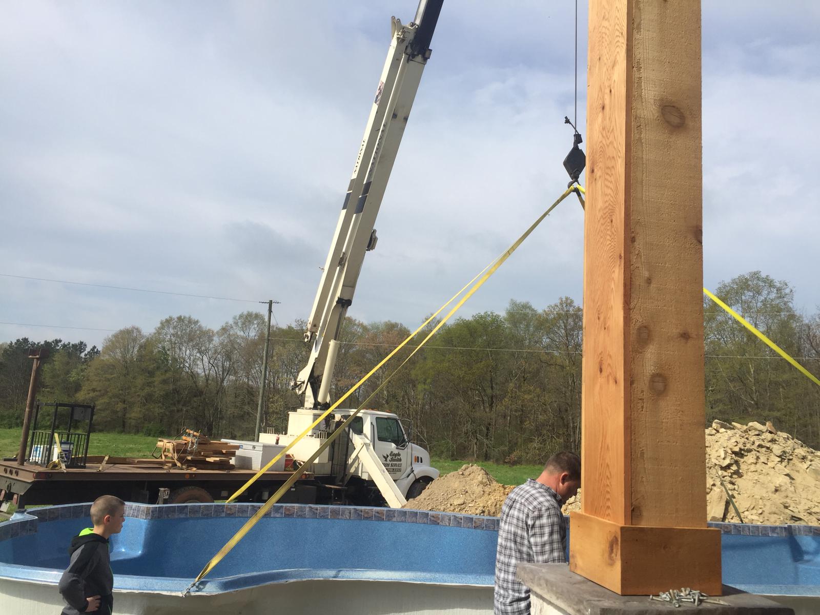 Crane service installing a pool at Statesville, NC home