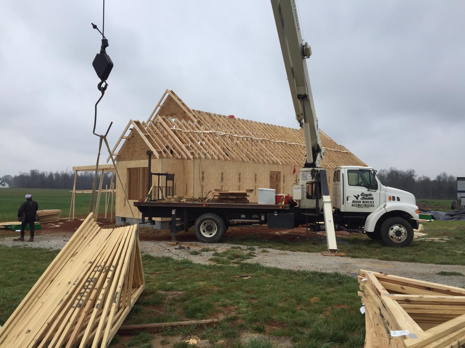Crane truck helping install a home in Lexington, NC