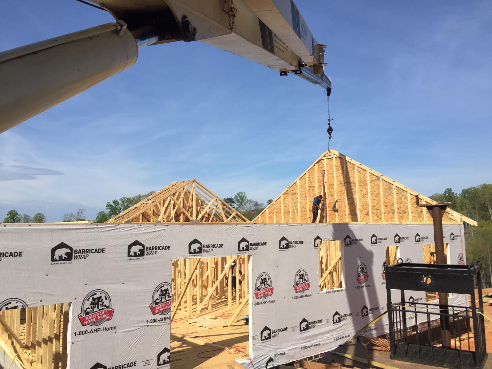 Roof of a home put in place by crane service in Statesville, NC