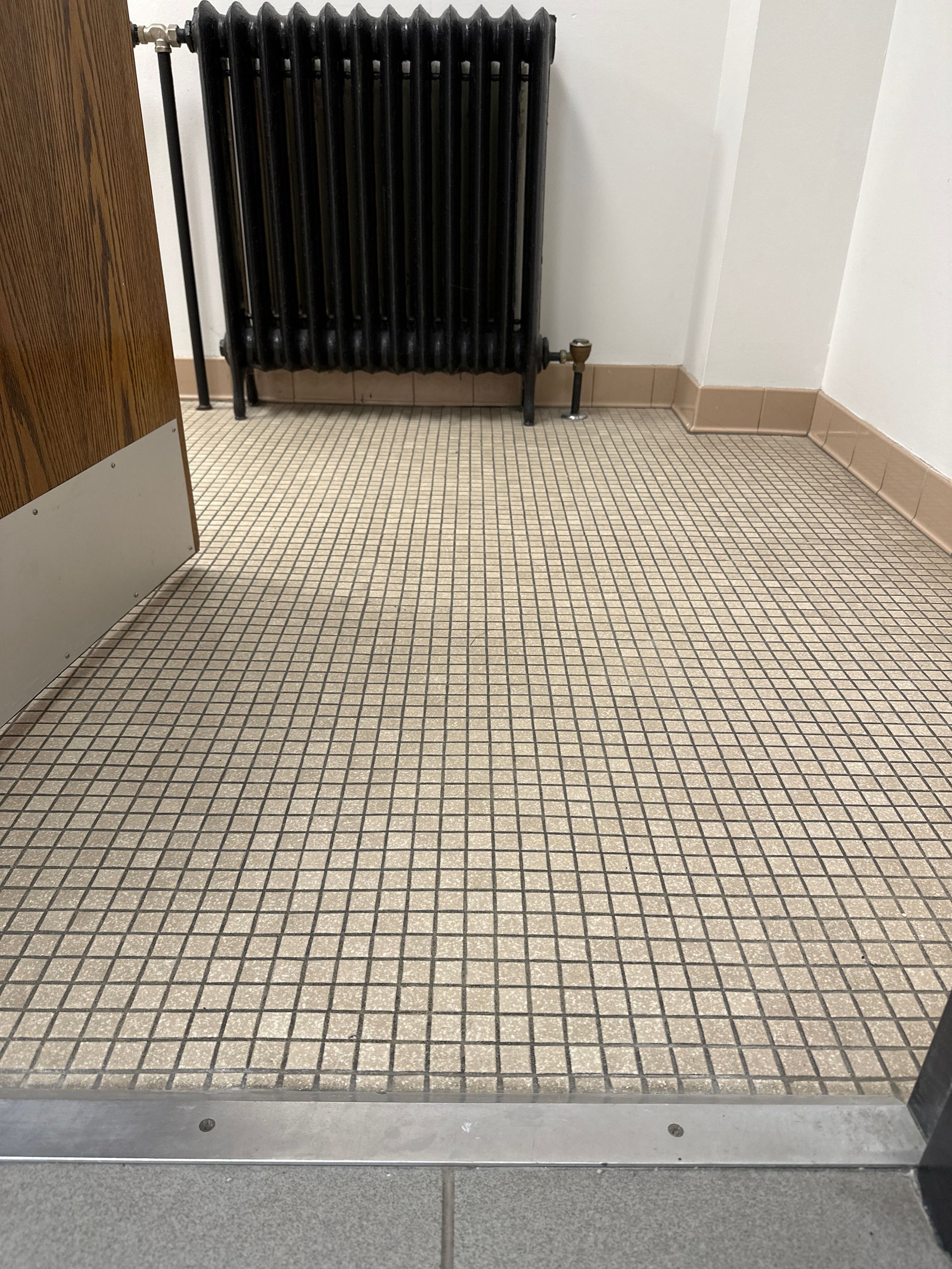 Before Replacing the Restroom Tile — Darien, IL — Sterling Services