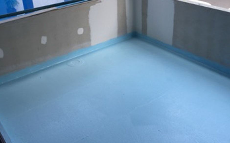 Blue Waterproof Coating Applied to a Corner of a Room, Walls Partially Finished — 1 Time Waterproofing In Lismore, NSW