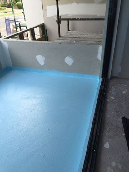 Blue Waterproof Membrane on a Balcony Floor — 1 Time Waterproofing In Tweed Heads, NSW