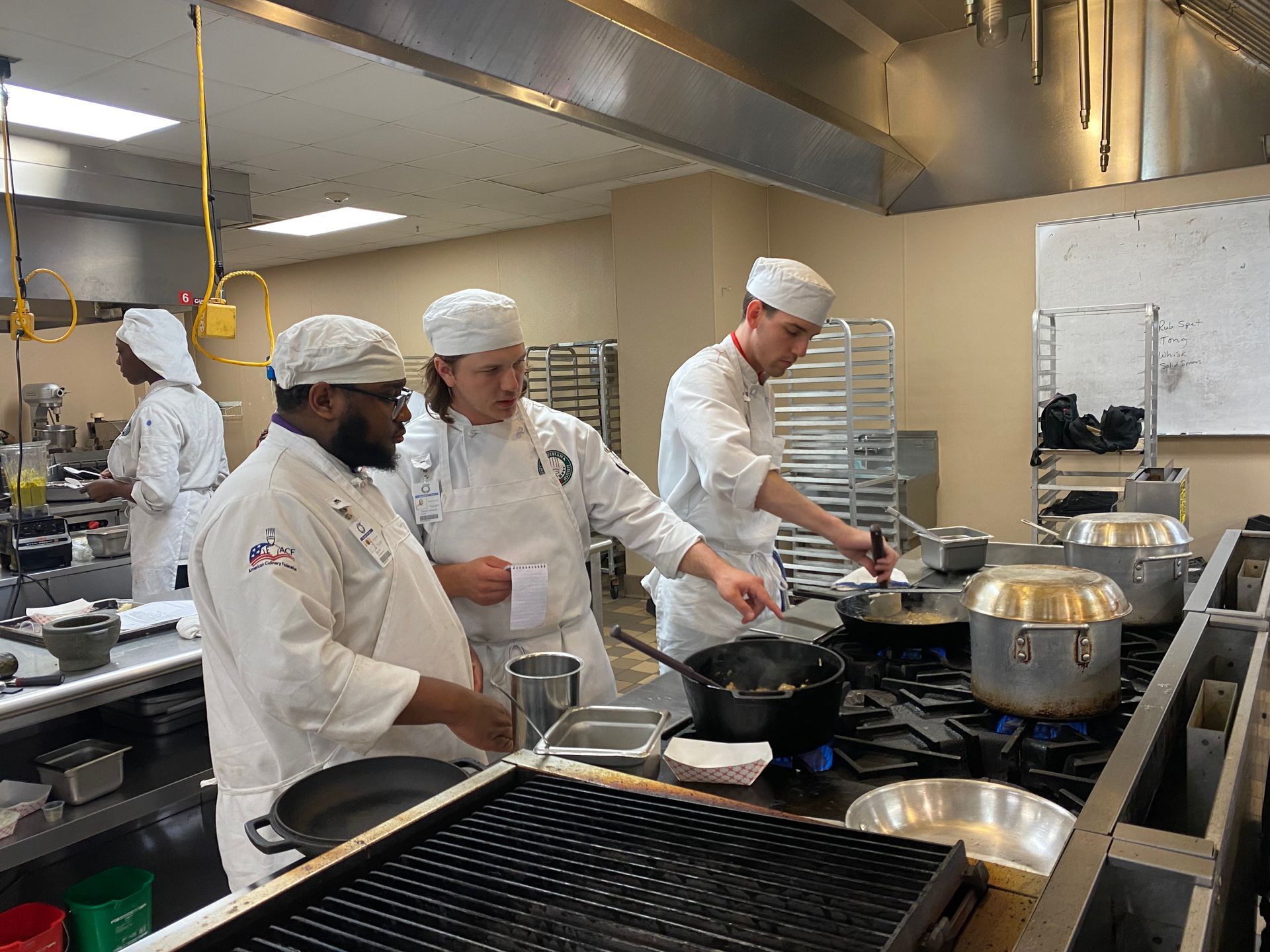 Students learn the value of collaboration in the kitchen at LCI. 