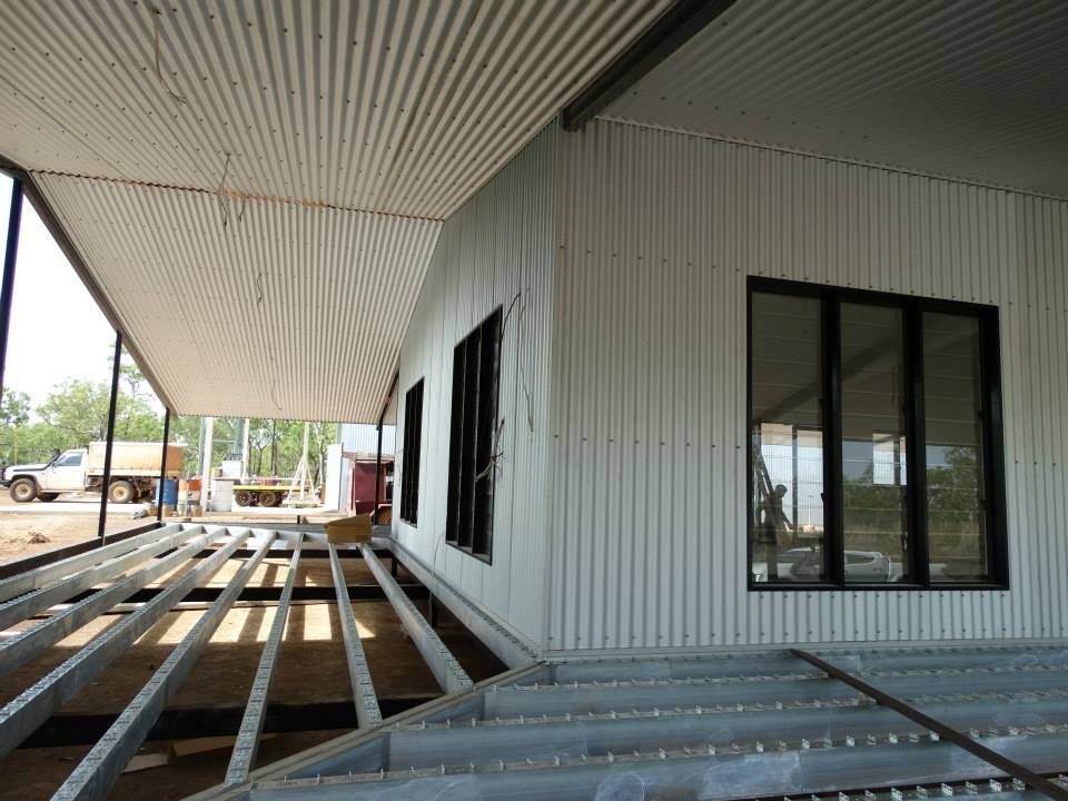 A White House With Black Windows Is Under Construction — SLS Builders Pty Ltd in Humpty Doo, NT