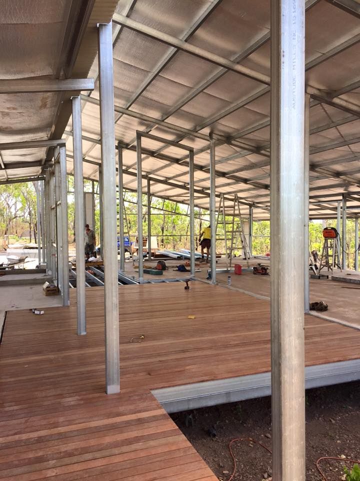 A Large Metal Structure With A Wooden Floor Underneath It — SLS Builders Pty Ltd in Humpty Doo, NT