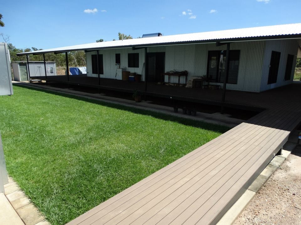 A House With a Covered Porch and a Wooden Deck — SLS Builders Pty Ltd in Humpty Doo, NT