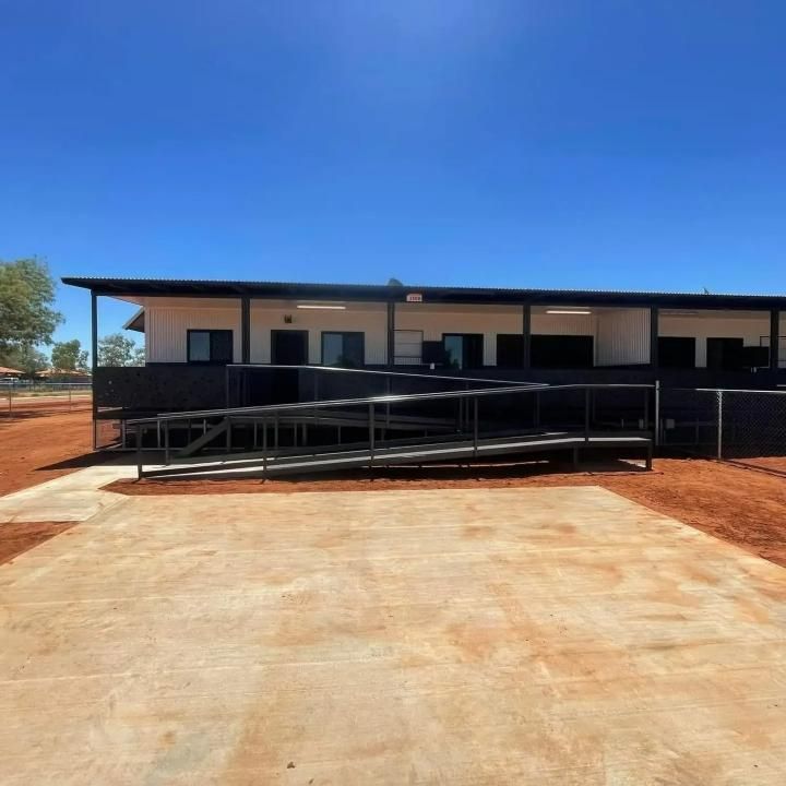 A Building With a Ramp in Front of It — SLS Builders Pty Ltd in Humpty Doo, NT