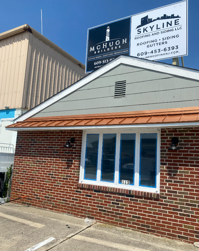 A brick building with a sign that says skyline on it