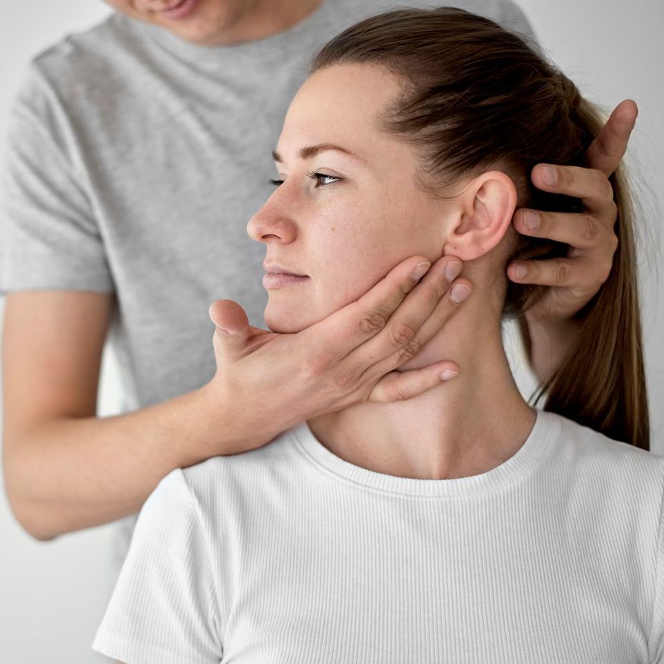 A man is using a hands-on techniques on a woman