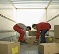 Two Workers Lifting Boxes