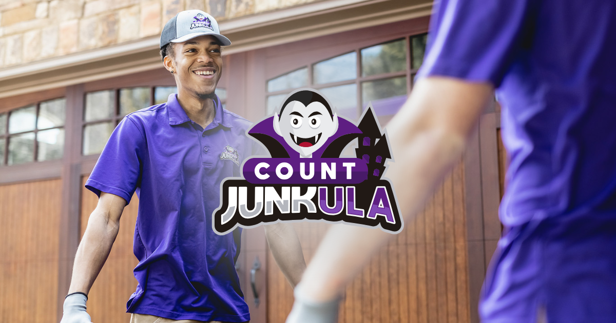 Two people in purple shirts in front of a building, with a “Count Junkula” logo centered.