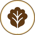 Brown leaf icon with white veins inside a white circle, framed by a brown ring.