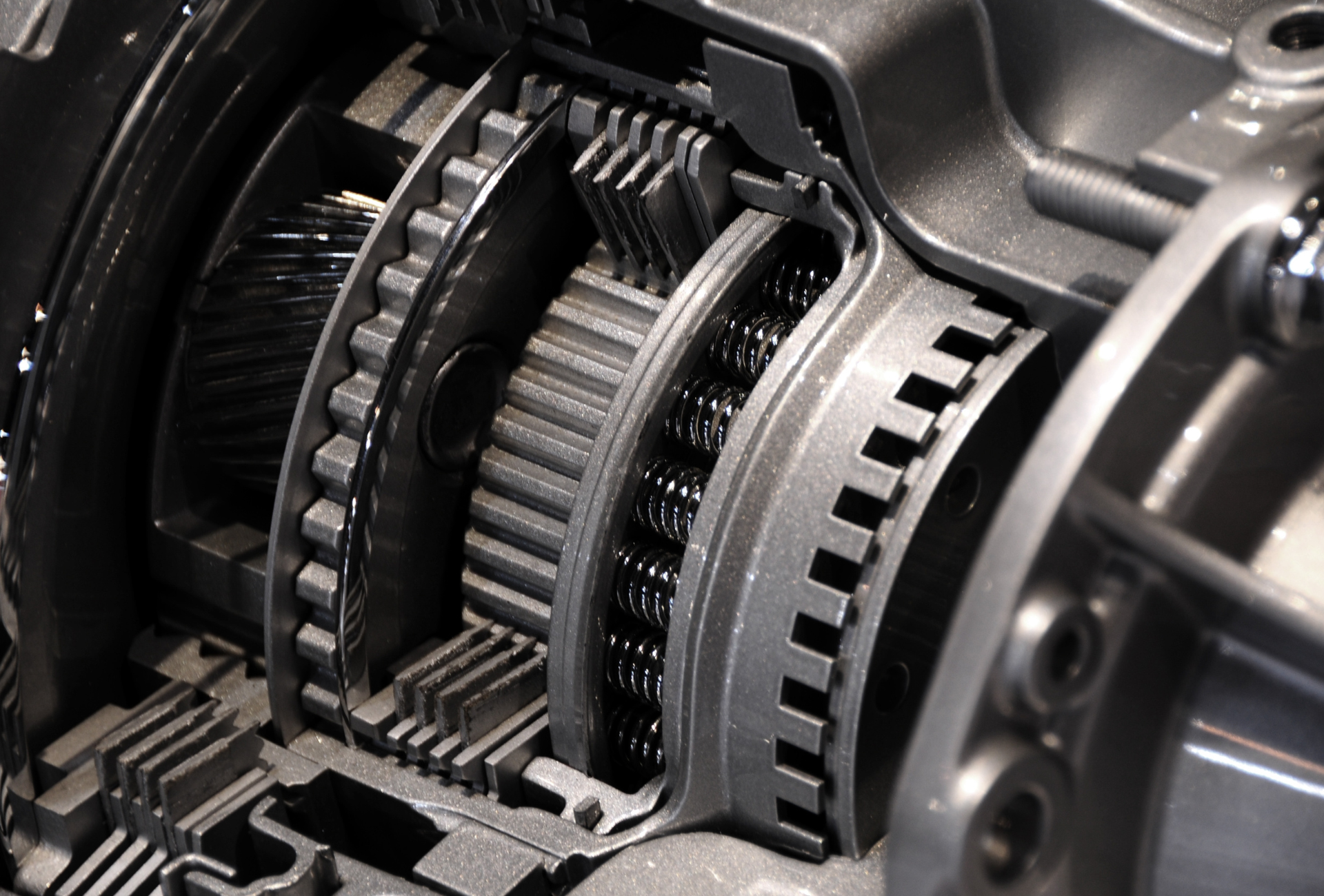 A close up of a gearbox with a lot of gears