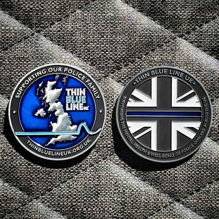 Two Thin Blue Line UK coins: one with a map and text, the other with a Union Jack and blue line.