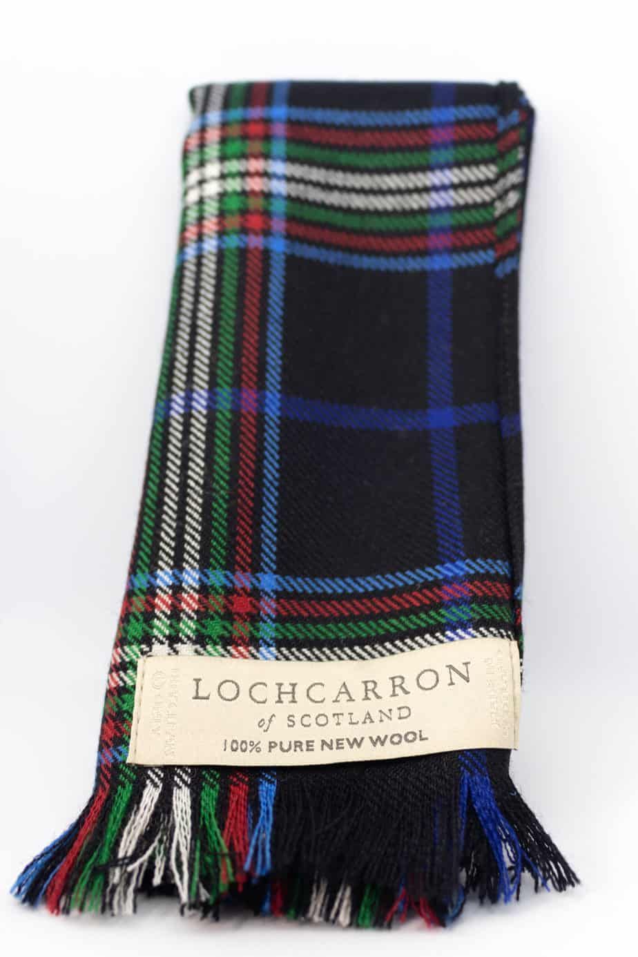 Tartan scarf from Lochcarron of Scotland with blue, black, red, green, and white plaid.
