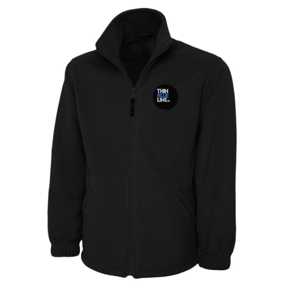 Black jacket with zipper and logo patch.