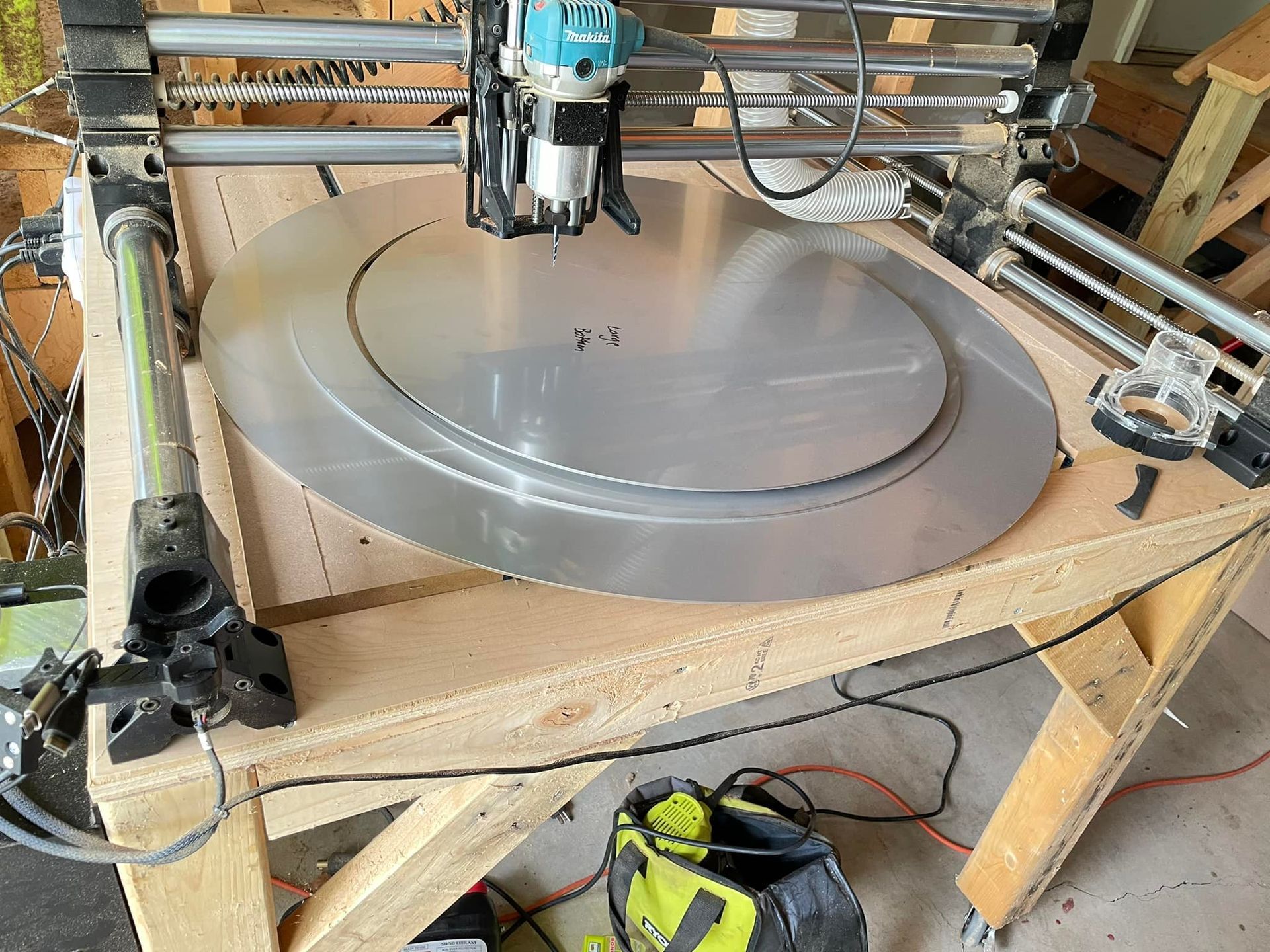 A machine is sitting on top of a wooden table.