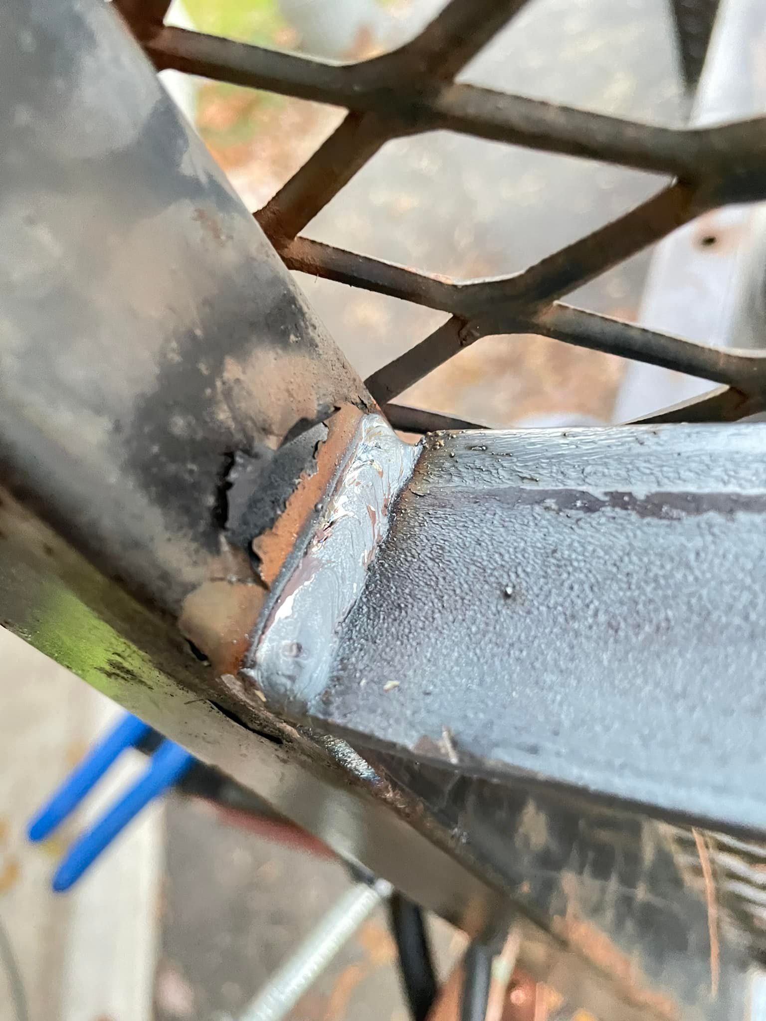 A close up of a piece of metal with a hole in it.