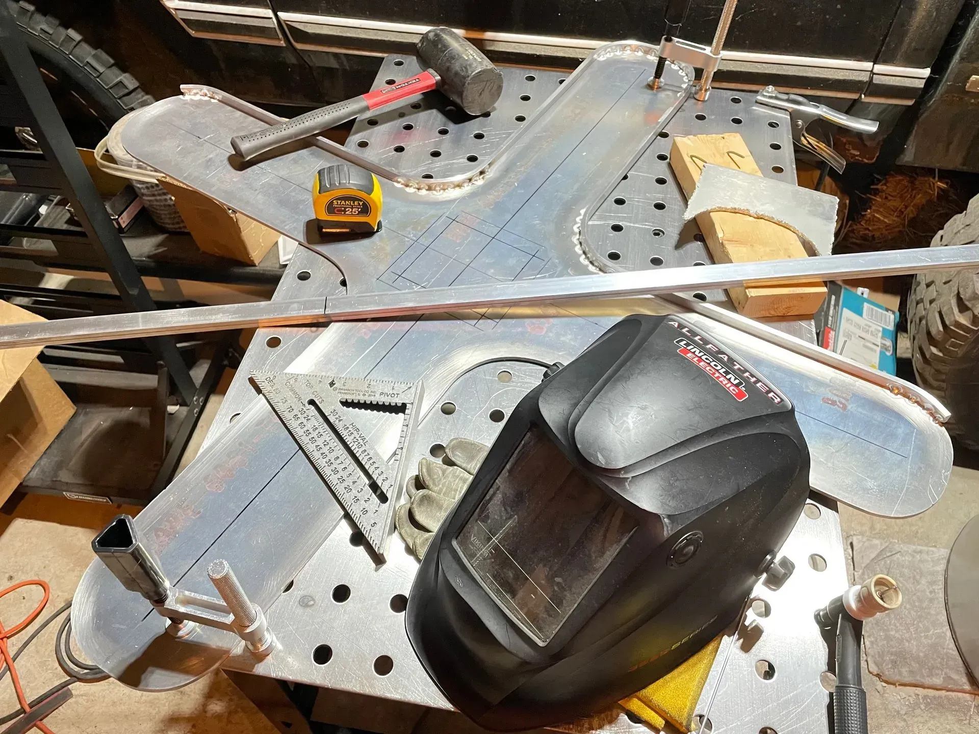 A welding helmet is sitting on top of a table