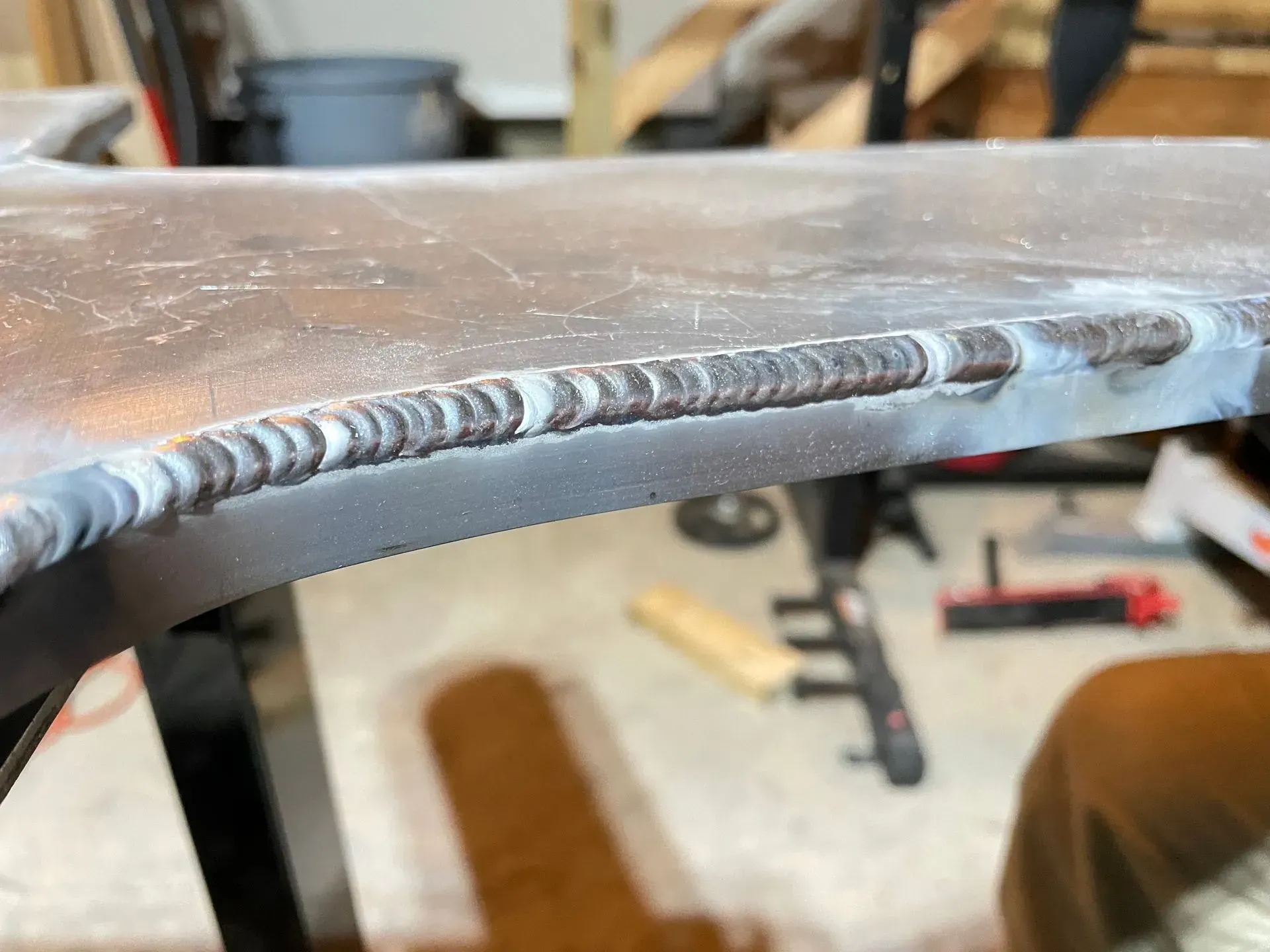 A close up of a piece of metal with welding on it.