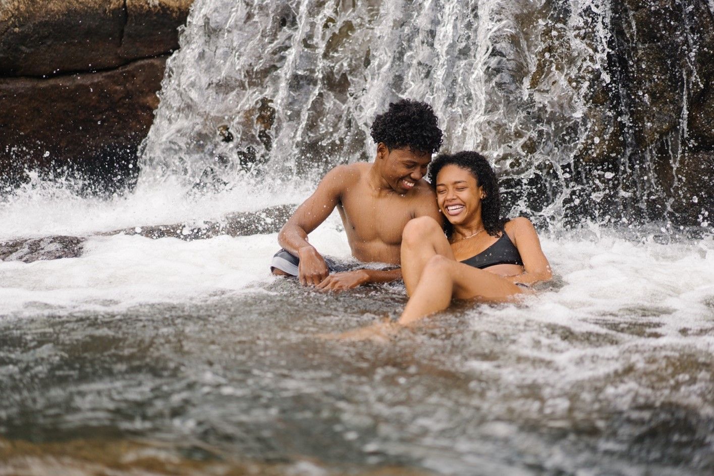 Rise Coaching - Couple sitting in Waterfall
