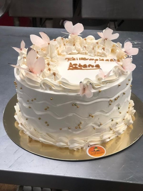 A cake with the name athens on it