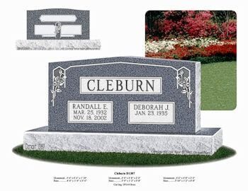 A dark grey granite headstone labeled